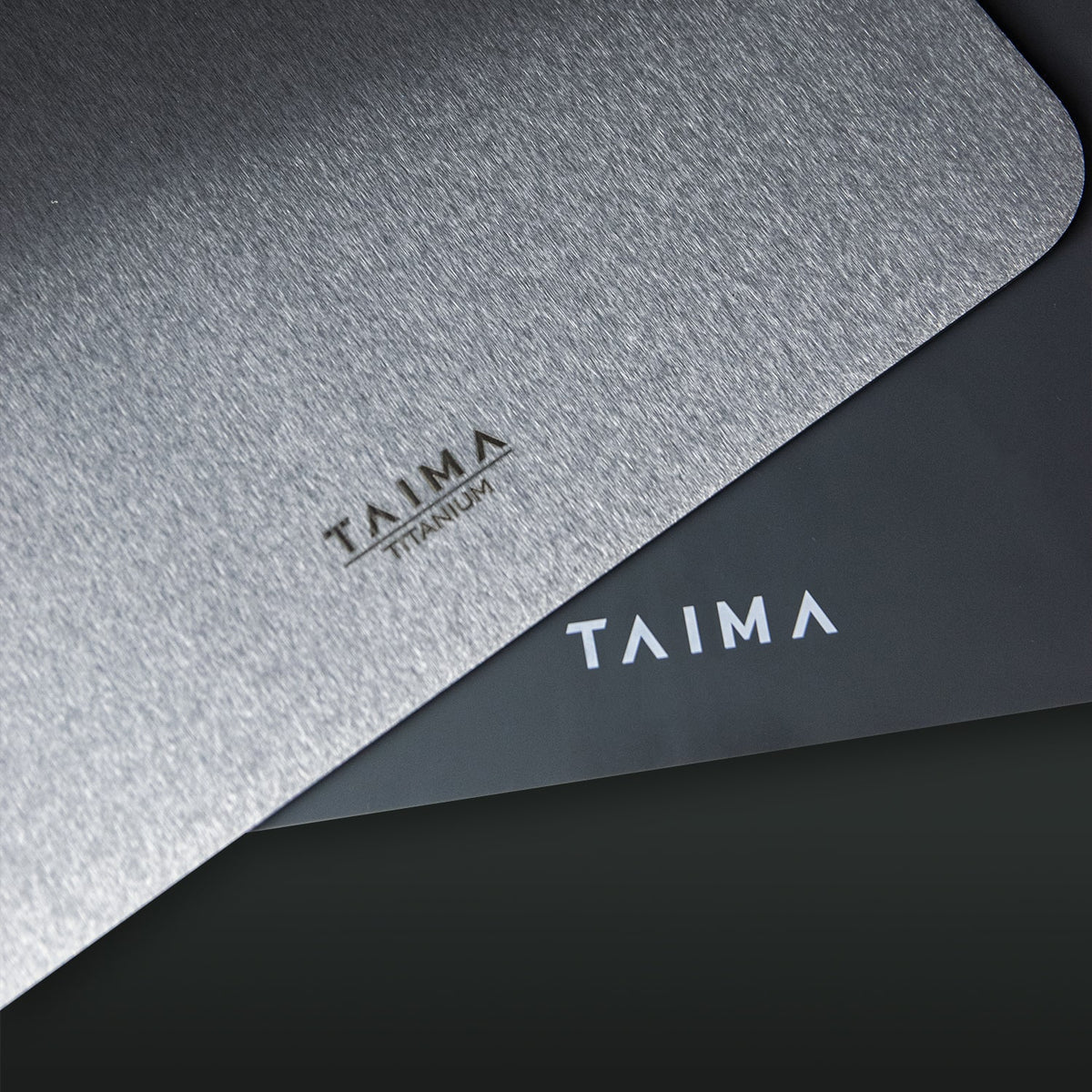 Close-up of TAIMA branded materials with a metallic finish.