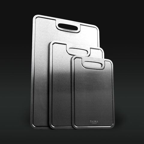 Three Titanium cutting boards with handles