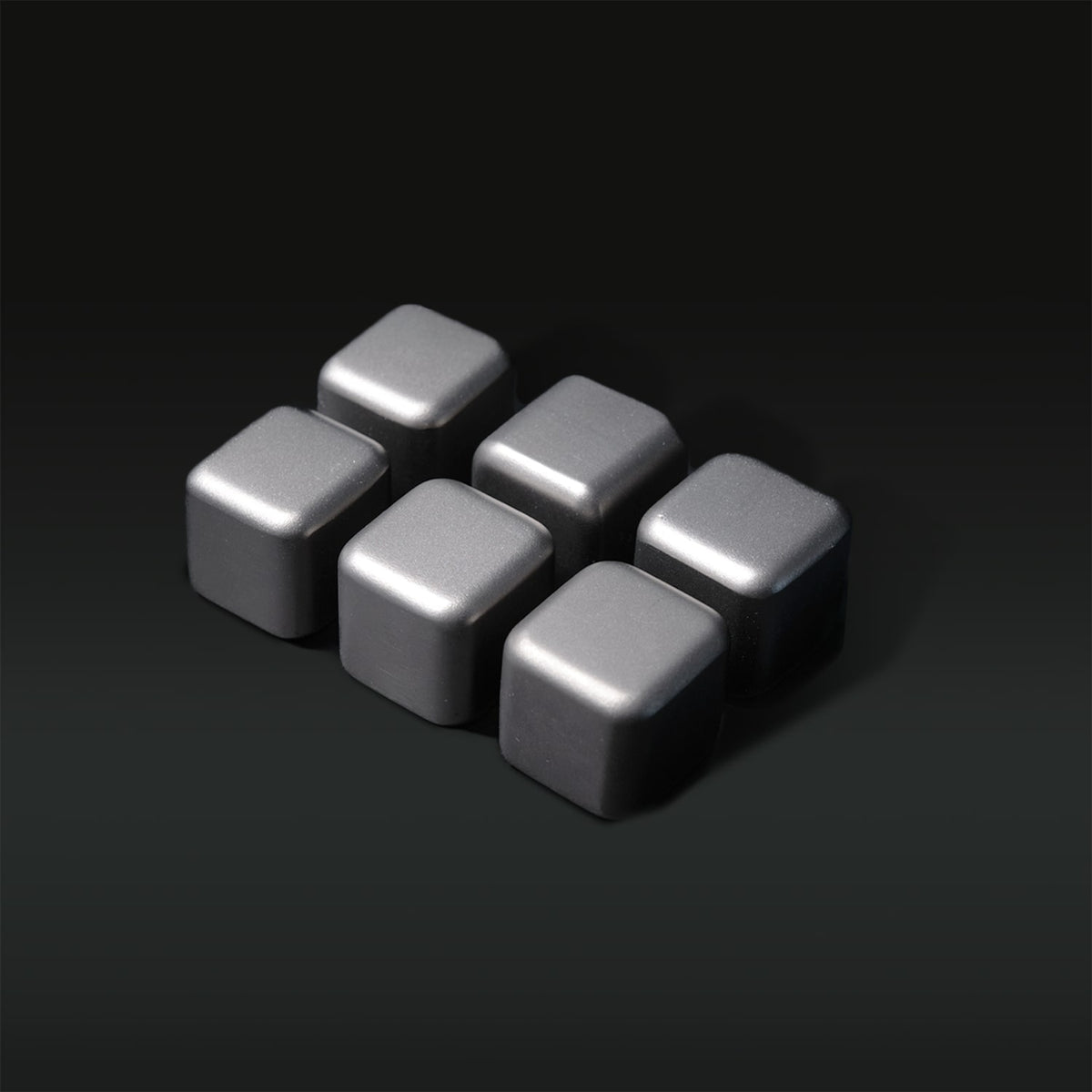 Titanium cubes arranged in a pattern on a black background