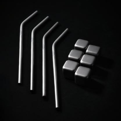Set of metal straws and metal cubes
