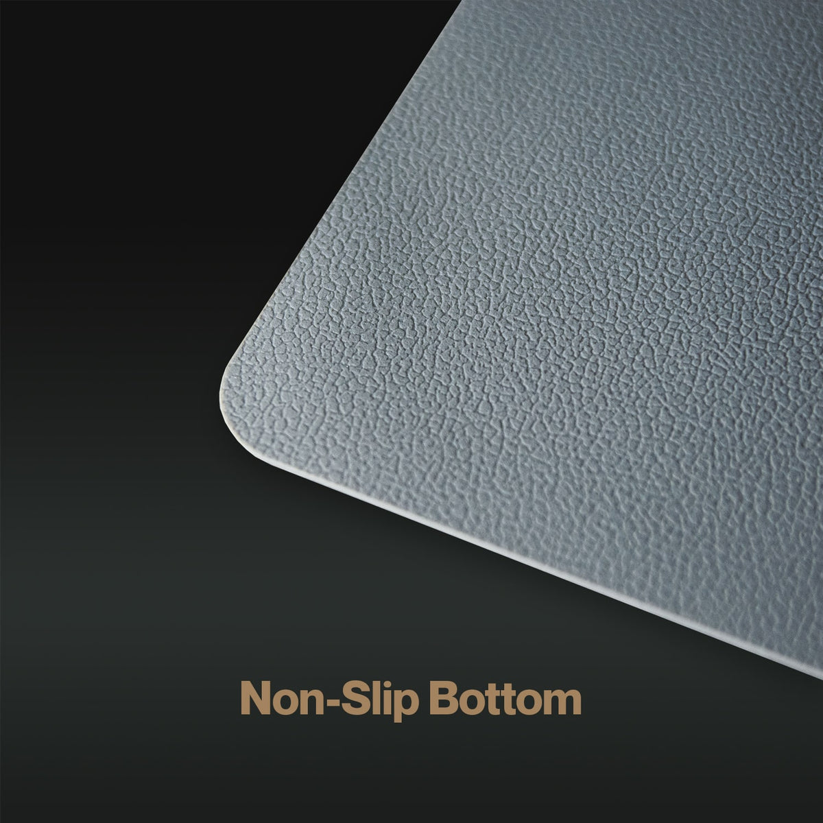 Textured gray mat with 'Non-Slip Bottom' label on a black background