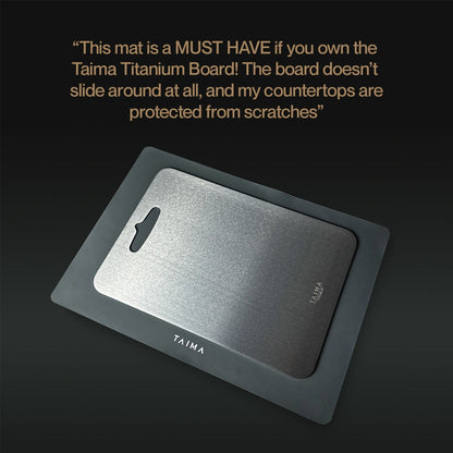 Taima Titanium Board with protective mat on a dark background